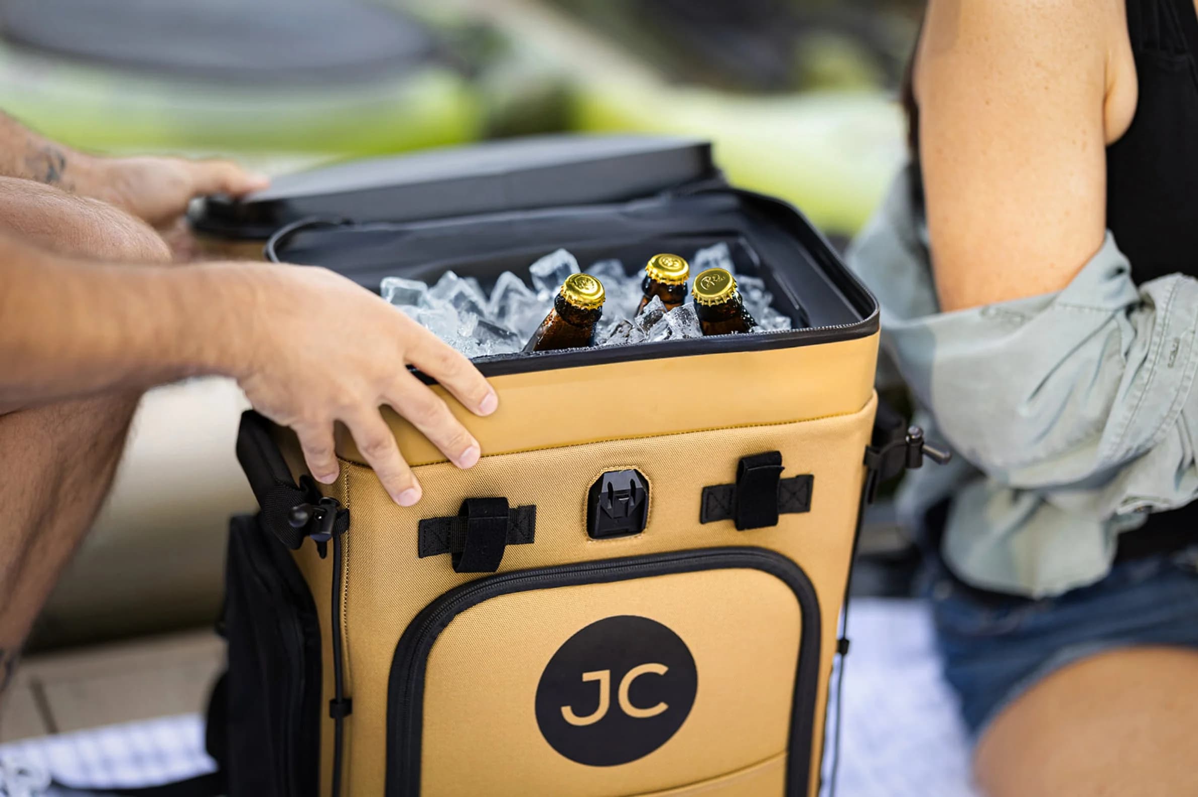 Cooler packed with bottles on ice