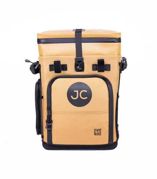 Tan JustinCASE Convertible Backpack cooler with black straps and JC logo